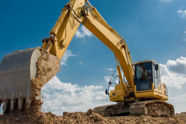 Omaha construction worker dies when bucket connected to a backhoe detaches, falls