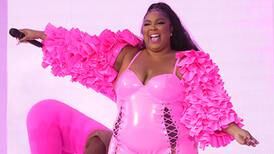Lizzo turns heads by filming herself at the beach in a wedding gown