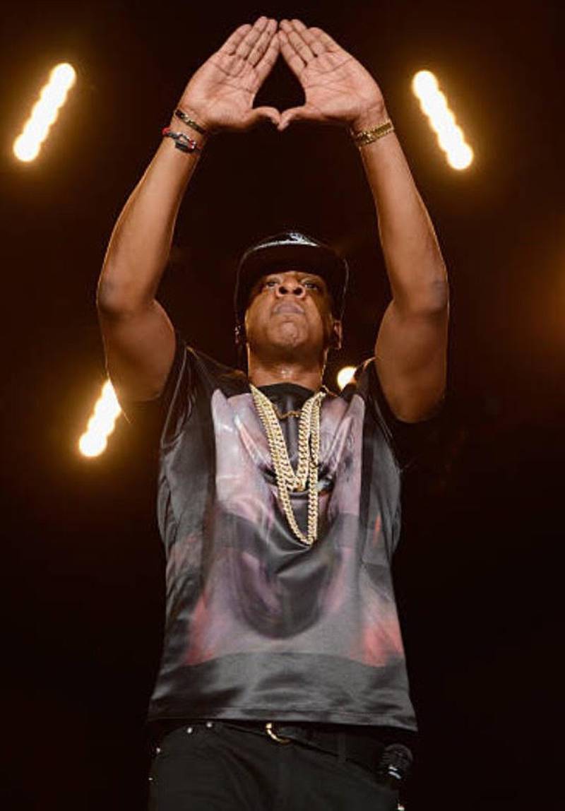 Jay-Z Hands Drink to Fan Trying to Give Him a Fist Bump