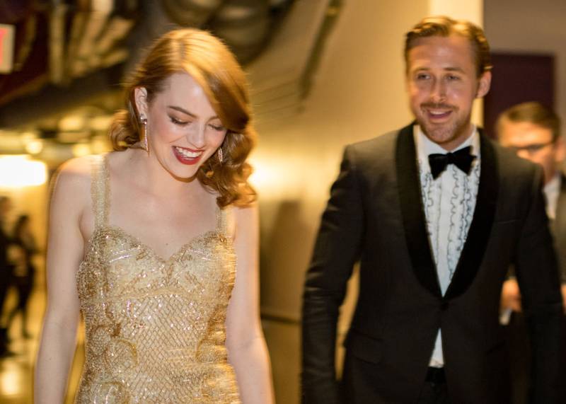 HOLLYWOOD, CA - FEBRUARY 26: Actor Ryan Gosling (R) and actress Emma Stone, winner of Best Actress for 'La La Land' backstage during the 89th Annual Academy Awards at Hollywood & Highland Center on February 26, 2017 in Hollywood, California. (Photo by Christopher Polk/Getty Images)