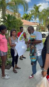 WHQT WEDR Hot 105 99Jamz Holiday Food Drop-Off Caravan