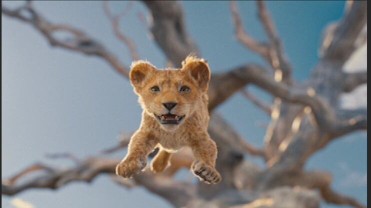 An animated lion cub leaping from a tree.