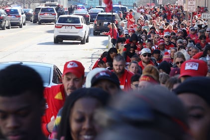 KANSAS CITY, MISSOURI - FEBRUARY 14: People leave the area following a shooting at Union Station during the Kansas City Chiefs Super Bowl LVIII victory parade on February 14, 2024 in Kansas City, Missouri. Several people were shot and two people were detained after a rally celebrating the Chiefs Super Bowl victory. (Photo by Eric Thomas/Getty Images)