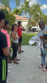 WHQT WEDR Hot 105 99Jamz Holiday Food Drop-Off Caravan