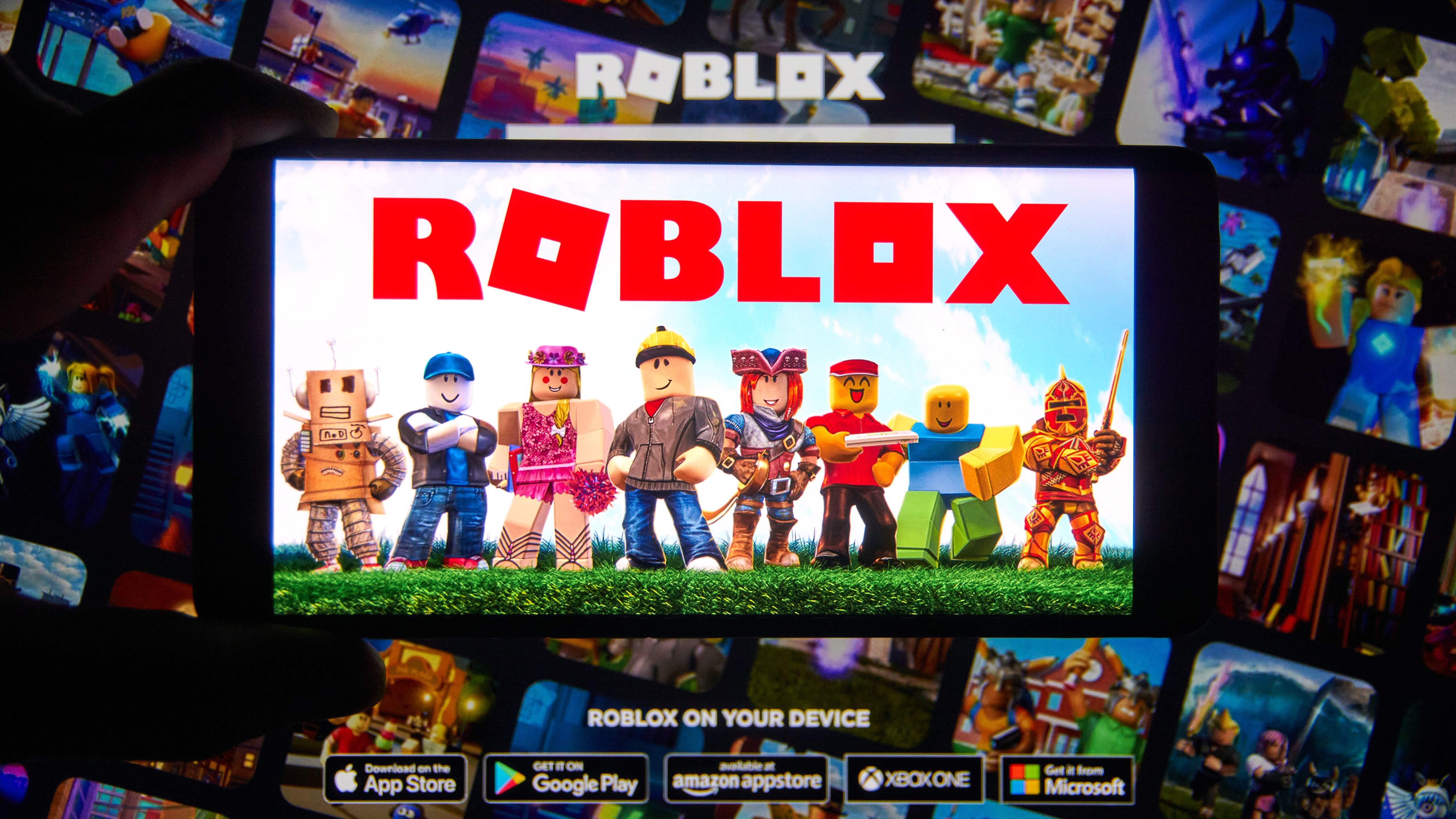 Roblox logo and app on a mobile screen