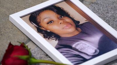 WASHINGTON, DC - JULY 30: A photo of Breonna Taylor is seen among other photos of women who have lost their lives as a result of violence during the 2nd Annual Defend Black Women March in Black Lives Matter Plaza on July 30, 2022 in Washington, DC. (Photo by Leigh Vogel/Getty Images for Frontline Action Hub)